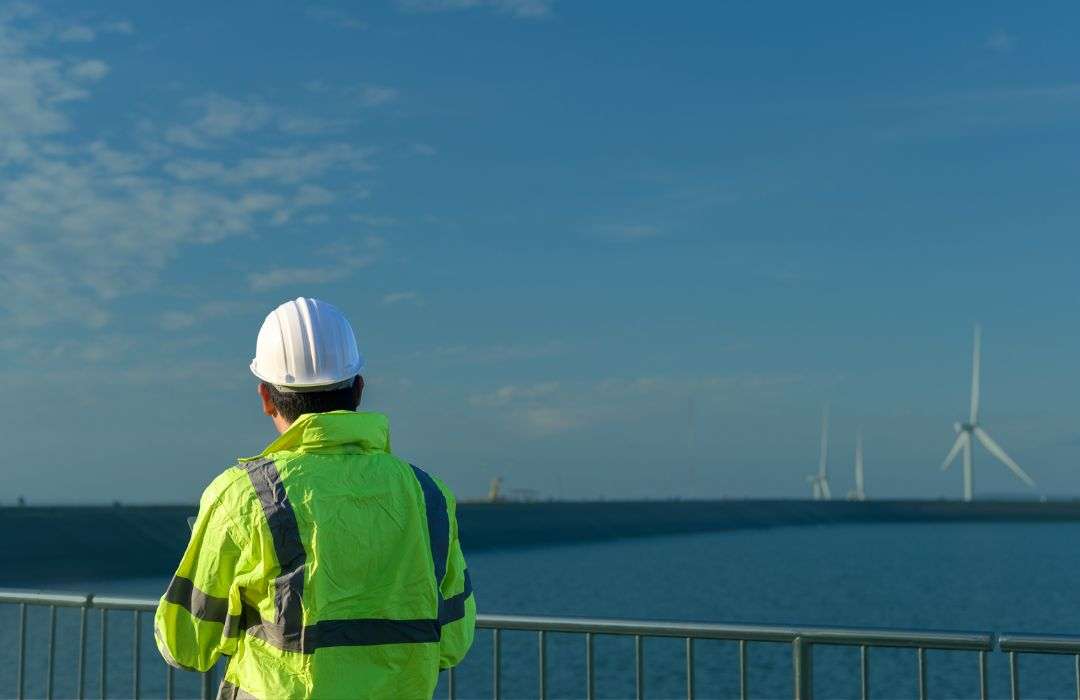 worker enjoying the sea view